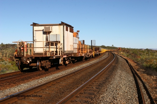 0665 Mt Newman Mining Workshops 060714 6815
Hesta Siding, view from the rear of the rail recovery and transport train as it snakes around the curves. Crib waggon 665 a former Magor USA built ore waggon, heavily modified by Mt Newman Mining workshops and fitted with an ATCO donga.
Keywords: Mt-Newman-Mining-WS;Magor-USA;BHP-rail-train;