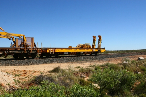 6214 Gemco WA 080621 2722
Tabba South, new Lead-Off Lead-On waggon STTR class STTR 6214 on the end of the Steel Train or rail recovery and transport train, built by Gemco Rail WA, the chutes can be seen standing up with the squeeze rollers behind the mesh.
Keywords: Gemco-Rail-WA;BHP-rail-train;STTR-type;STTR6214;