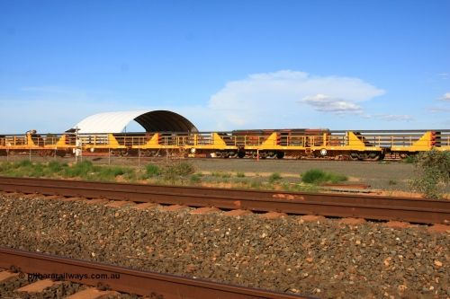 6038 Gemco WA 110208 9446
Flash Butt yard, new rail stock carrier waggons 6038 and 6031 loaded with strings of rail, built by Gemco Rail in late 2009-10.
Keywords: BHP-rail-train;Gemco-Rail-WA;