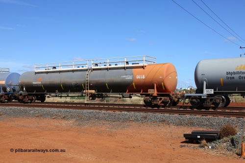 0018 Comeng WA 150314 7750
Bing Siding, empty 116 kL Comeng WA built tank waggon 0018 from 1974-5, one of six such tank waggons, wearing the BHP Billiton Earth livery.
Keywords: Comeng-WA;BHP-tank-waggon;