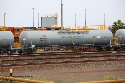0034 CNR - QRRS China 150523 8209
Nelson Point, empty 116 kL CNR-QRRS of China built tank waggon 0034, one of a second batch delivered in 2015 with safety slogan 'Think Safe + Work Safe = Go Home Safe'.
Keywords: CNR-QRRS-China;BHP-tank-waggon;