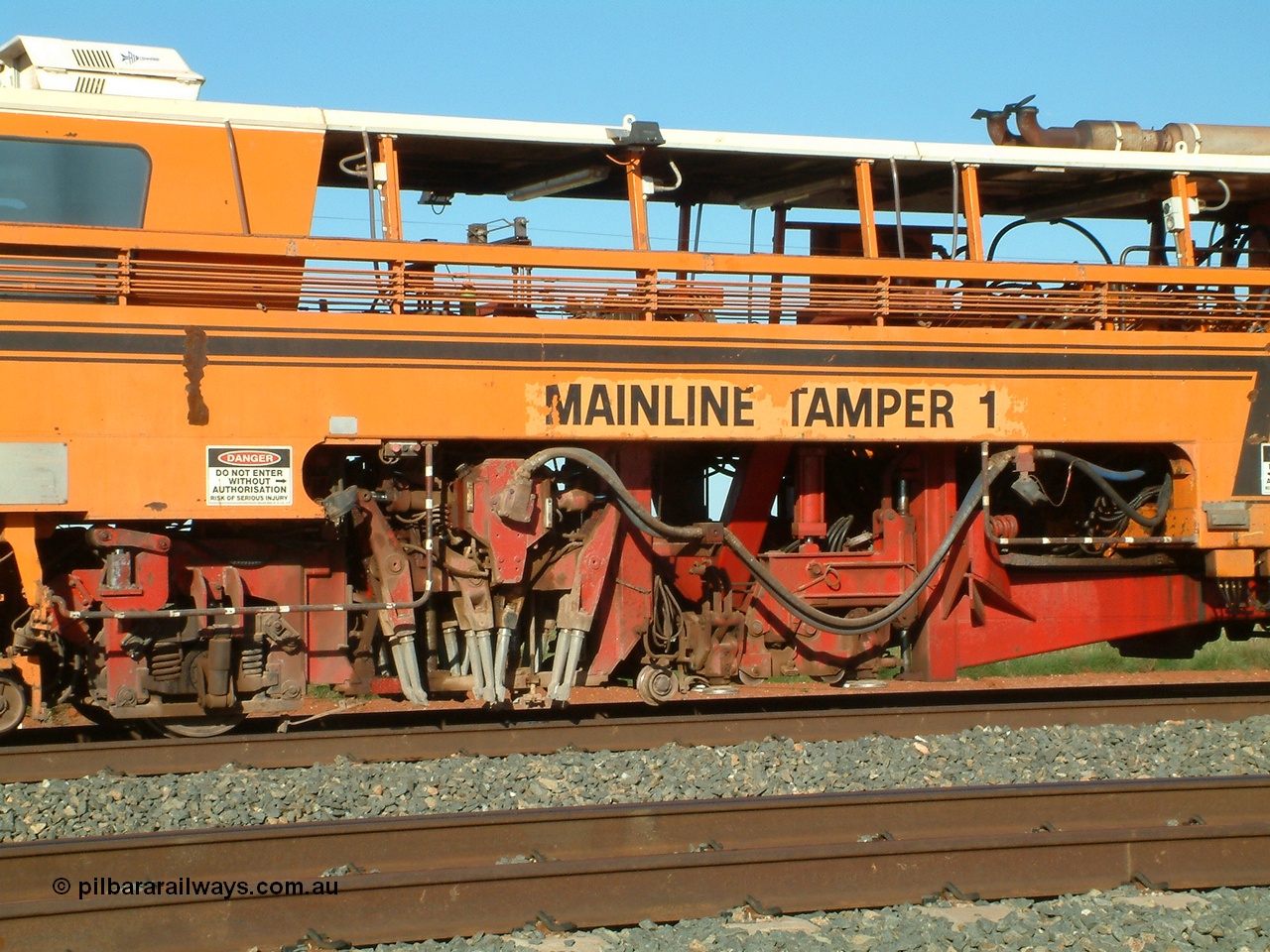 040408 162720
Mooka Siding north backtrack, view of the tamping mechanism of BHP's mainline Tamper 1, Plasser Australia 09-32 CAT model with serial 306. 8th April 2004.
Keywords: Tamper1;Plasser-Australia;09-32-CAT;306;track-machine;