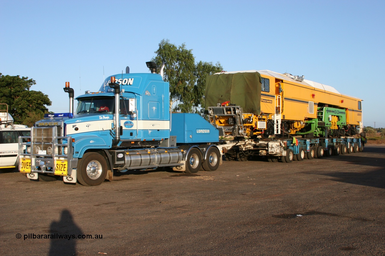 050409 0385
Shell Swagman Roadhouse, Lampson Mack Titan prime mover and eighty wheel float ready to deliver BHP's new mainline tamper a Plasser Australia 09-3X model with serial M480. 9th April 2005.
Keywords: Tamper3;Plasser-Australia;09-3X;M480;track-machine;