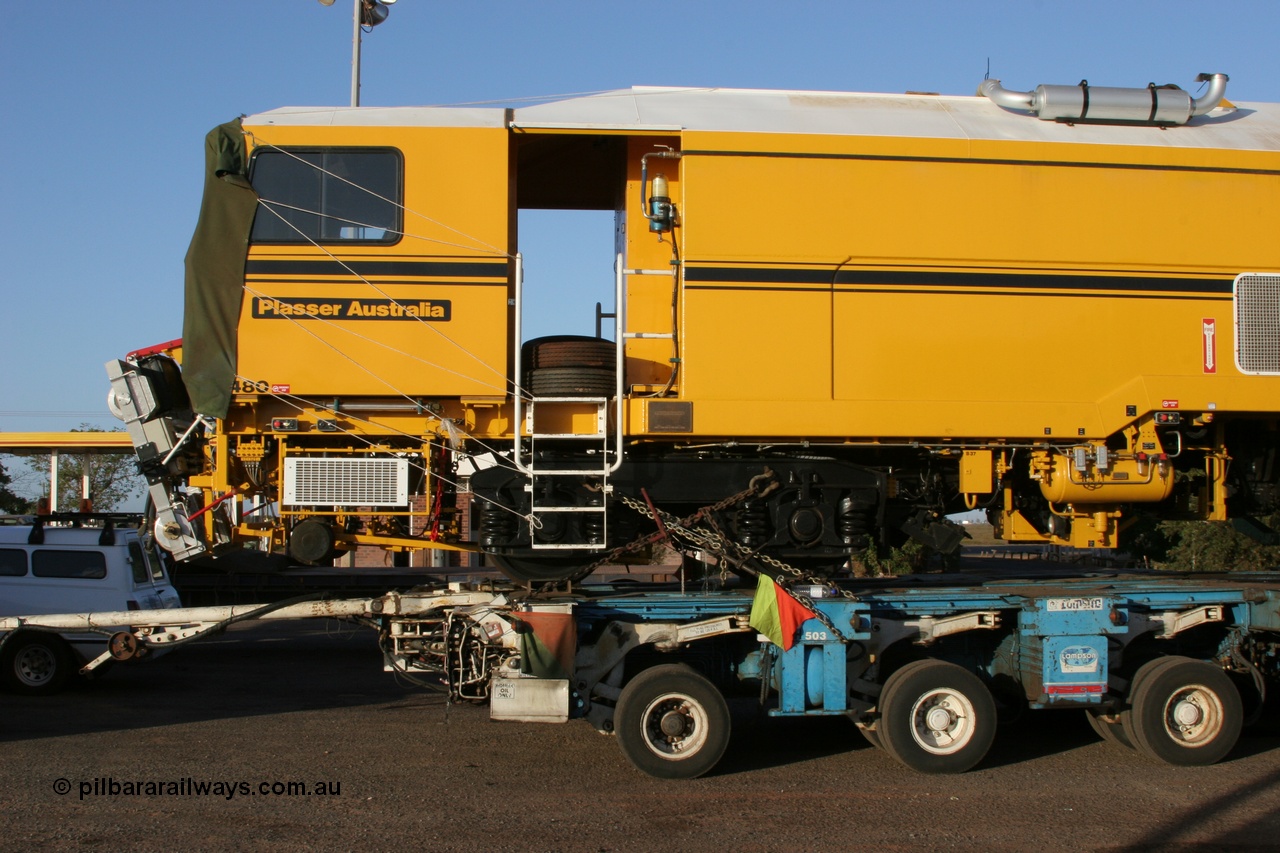 050409 0389
Shell Swagman Roadhouse, Lampson eighty wheel float ready to deliver BHP's new mainline tamper a Plasser Australia 09-3X model with serial M480 side view of cab front. 9th April 2005.
Keywords: Tamper3;Plasser-Australia;09-3X;M480;track-machine;