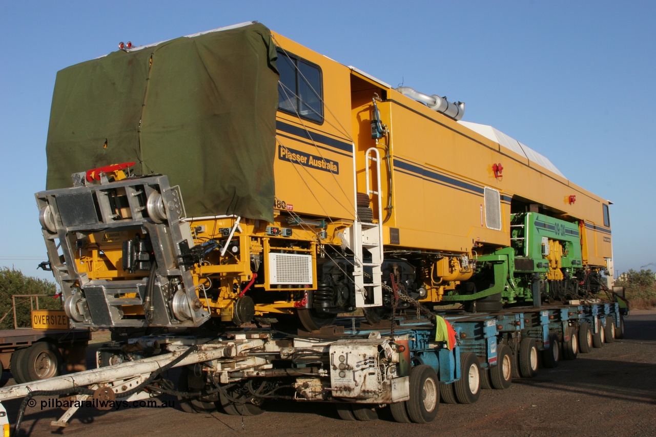 050409 0392
Shell Swagman Roadhouse, Lampson eighty wheel float ready to deliver BHP's new mainline tamper a Plasser Australia 09-3X model with serial M480. 9th April 2005.
Keywords: Tamper3;Plasser-Australia;09-3X;M480;track-machine;