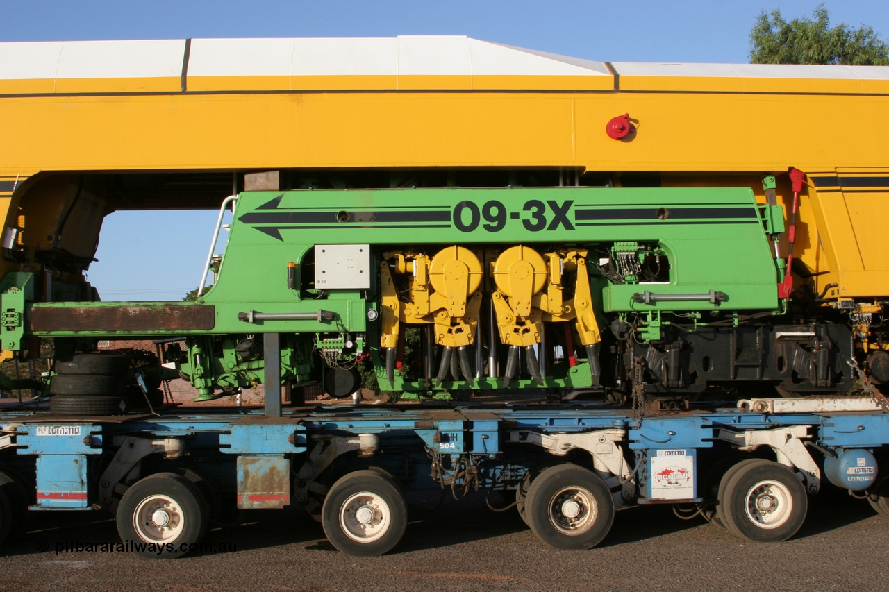 050409 0408
Shell Swagman Roadhouse, Lampson eighty wheel float ready to deliver BHP's new mainline tamper a Plasser Australia 09-3X model with serial M480 view of tamper frame and mechanism. 9th April 2005.
Keywords: Tamper3;Plasser-Australia;09-3X;M480;track-machine;