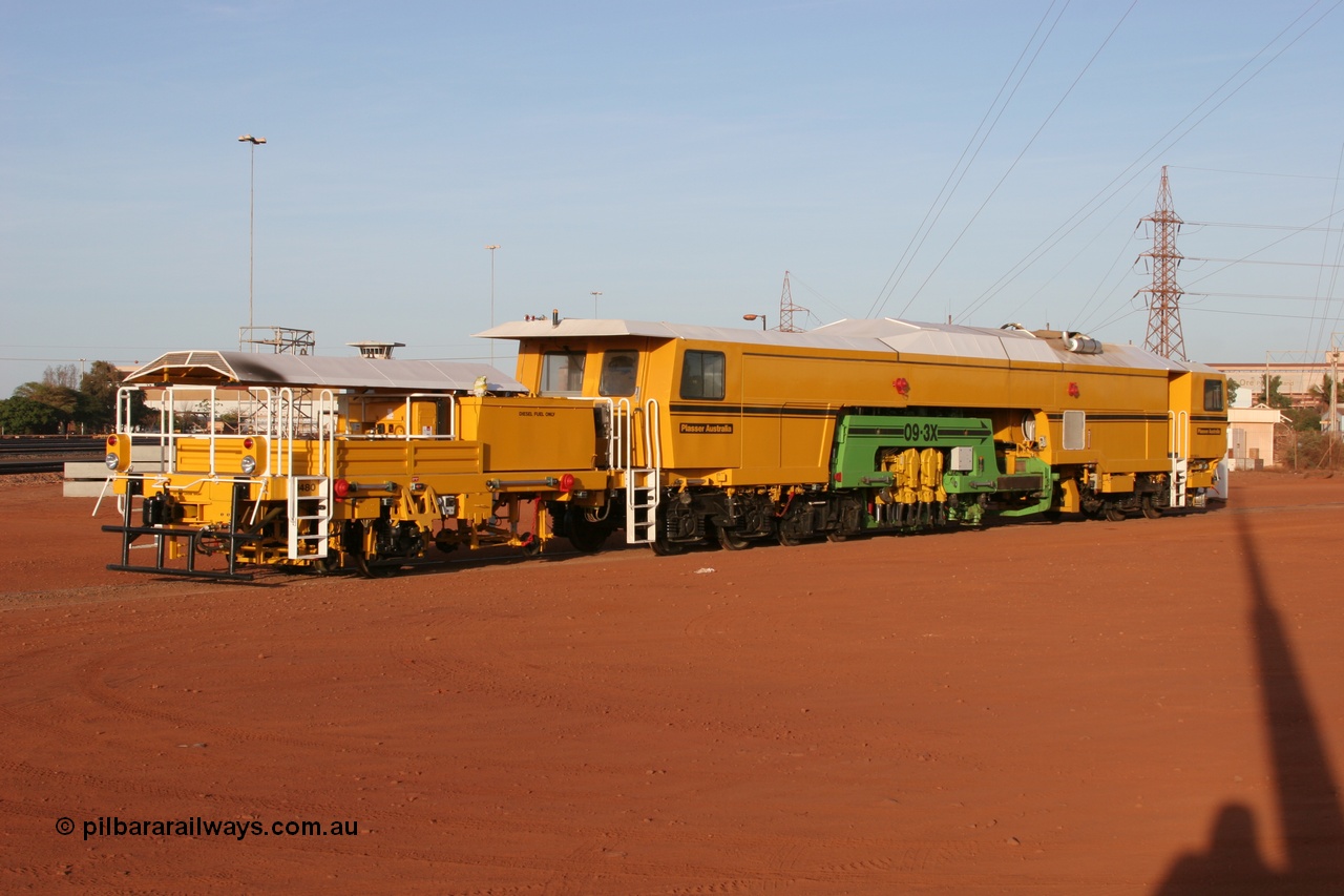 050410 0510
Nelson Point yard hard stand area sees brand new having only been delivered the day before, BHP track tamper to become Tamper 3, a Plasser Australia 09-3X model with serial M480. 10th April 2005.
Keywords: Tamper3;Plasser-Australia;09-3X;M480;track-machine;