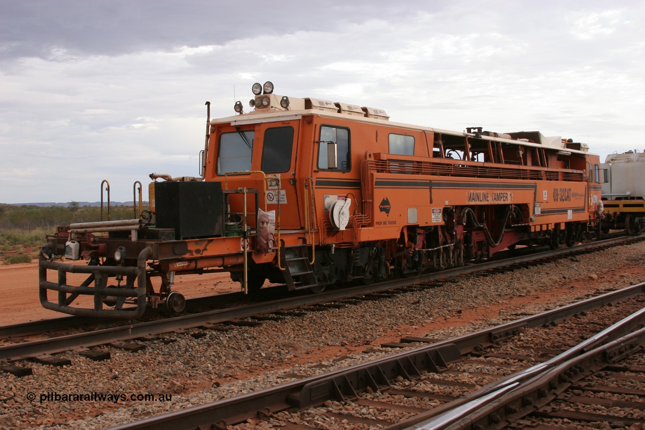 050412 0813
Abydos Siding backtrack, view of the rear of BHP's Mainline Tamper 1, a Plasser Australia 09-32 CAT model tamper serial 306 built in 1986. 12th April 2005.
Keywords: Tamper1;Plasser-Australia;09-32-CAT;306;track-machine;