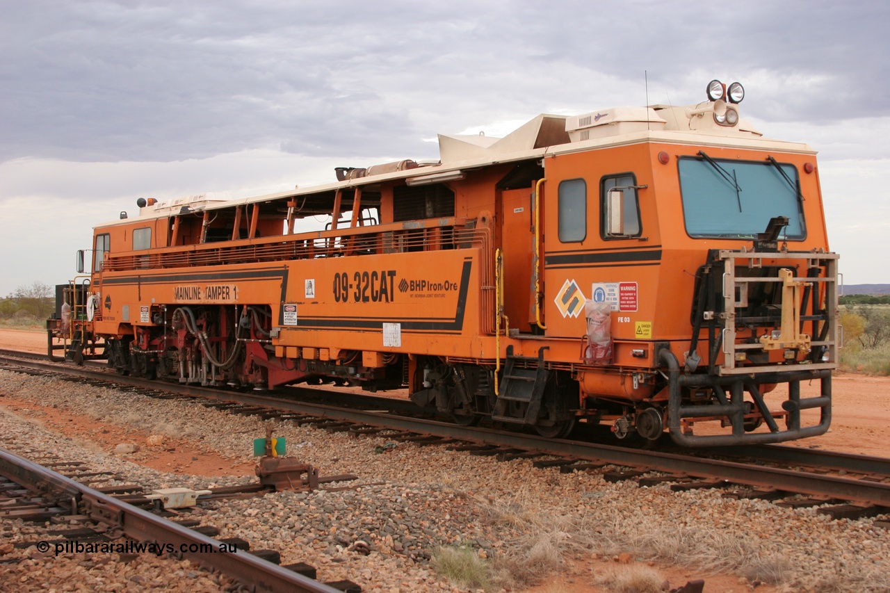 050412 0820
Abydos Siding backtrack, front view of BHP's Mainline Tamper 1, a Plasser Australia 09-32 CAT model tamper serial 306 built in 1986. 12th April 2005.
Keywords: Tamper1;Plasser-Australia;09-32-CAT;306;track-machine;