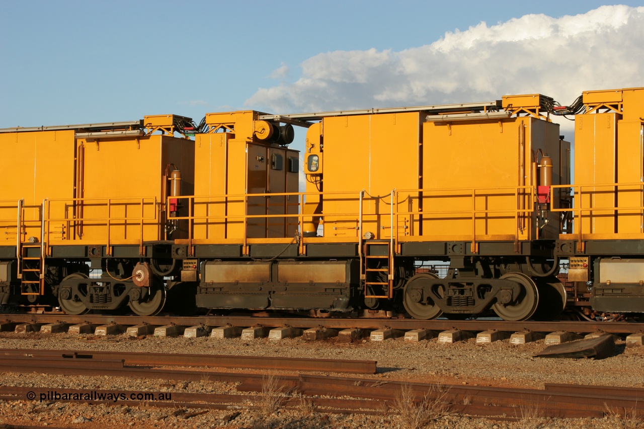 050414 0954
Flash Butt yard, Speno Australia's RR24 model 24 stone rail grinder serial M20 before it had id stickers fitted, this unit was later stickered as RG 1, view of the second grinding module coupled. 14th April 2005.
Keywords: Speno;RR24;M20;track-machine;