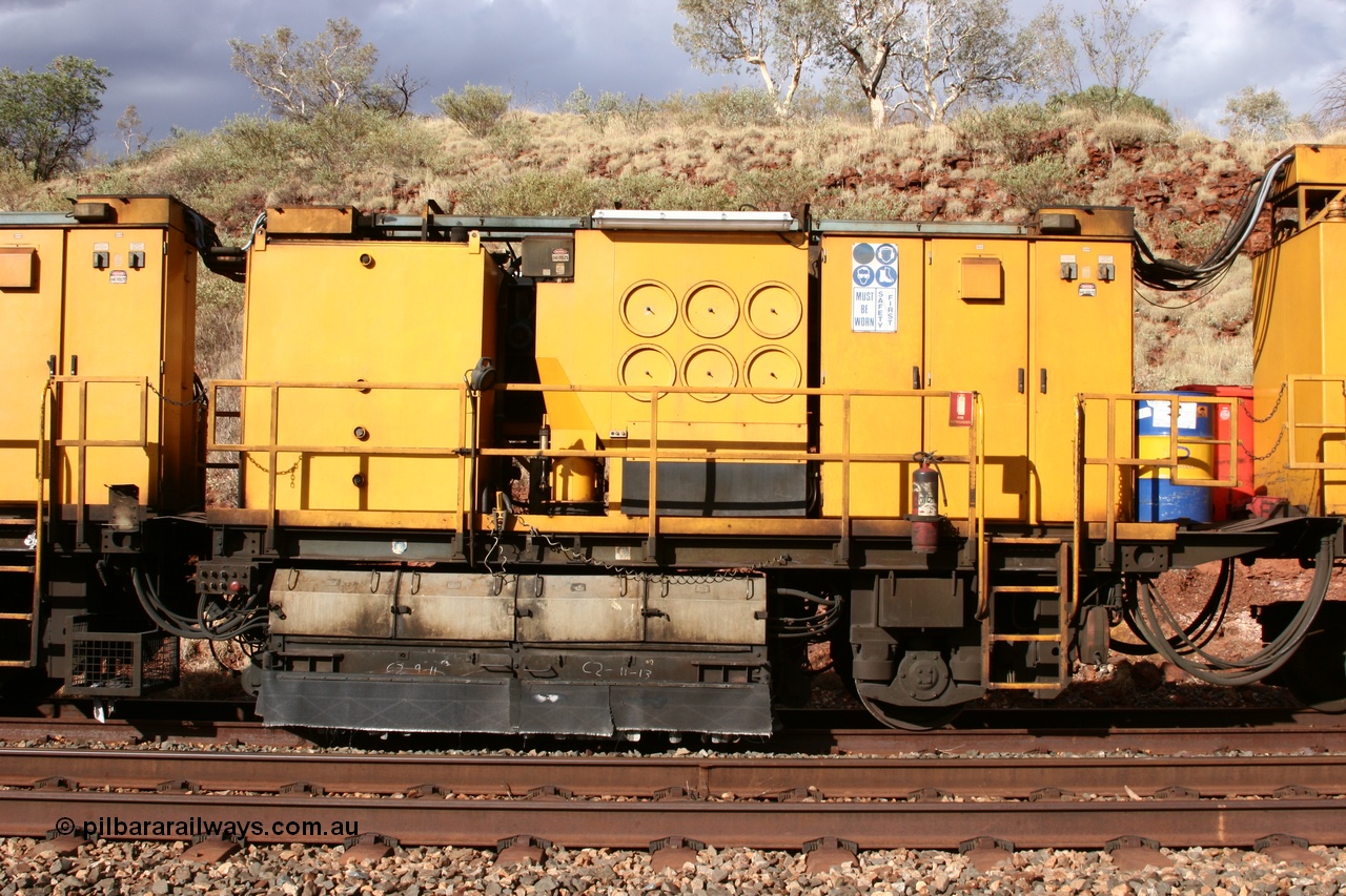 050421 1615
Hesta Siding backtrack, Speno Australia's 24 stone rail grinder before they had id stickers fitted, this unit was later stickered as RG 2, side view of the second grinding module. 21st April 2005.
Keywords: Speno;RR24;track-machine;
