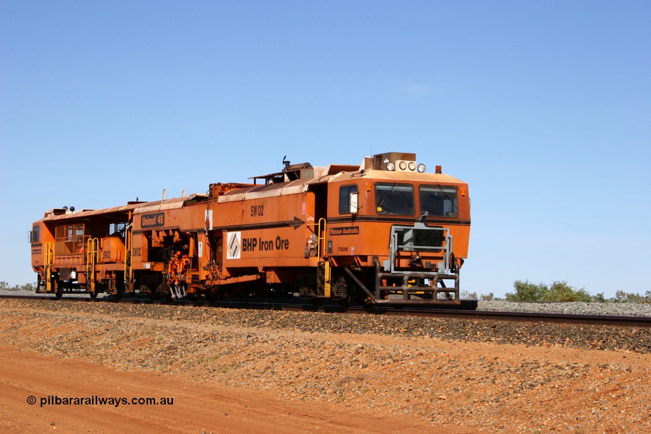 050518 2210
Bing Siding, BHP's Switch Tamper SW 02 is a Plasser Australia model Unimat S4 switch tamper runs along the passing track. 18th May 2005.
Keywords: SW02;Plasser-Australia;Unimat-4S;track-machine;