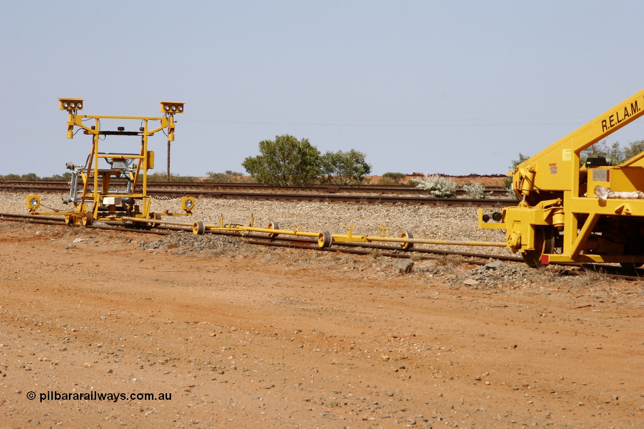 051001 5672
Flash Butt yard, Jackson model 6700 tamper serial 153246 lettered for Railway Equipment Leasing And Maintenance RELAM Inc undergoing delivery checks view of the light buggy and rods. 1st October 2005.
Keywords: Jackson;6700;153246;track-machine;