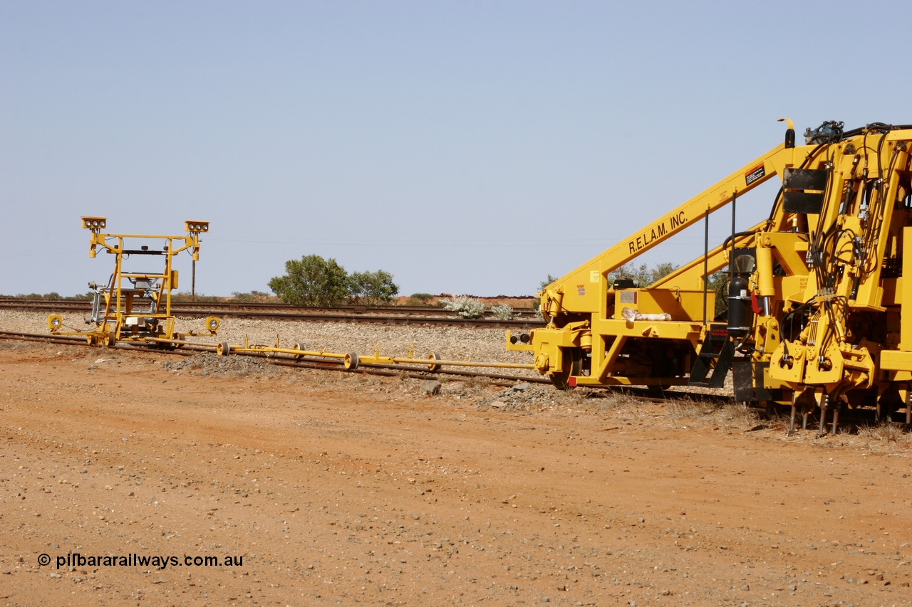 051001 5673
Flash Butt yard, Jackson model 6700 tamper serial 153246 lettered for Railway Equipment Leasing And Maintenance RELAM Inc undergoing delivery checks view of the light buggy and rods. 1st October 2005.
Keywords: Jackson;6700;153246;track-machine;