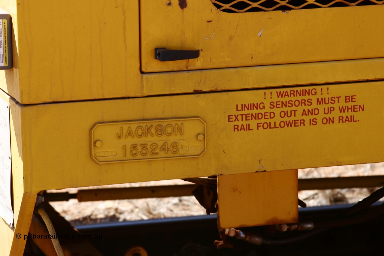 051001 5677
Flash Butt yard, Jackson model 6700 tamper serial 153246 lettered for Railway Equipment Leasing And Maintenance RELAM Inc undergoing delivery checks view of the builders plate. 1st October 2005.
Keywords: Jackson;6700;153246;track-machine;