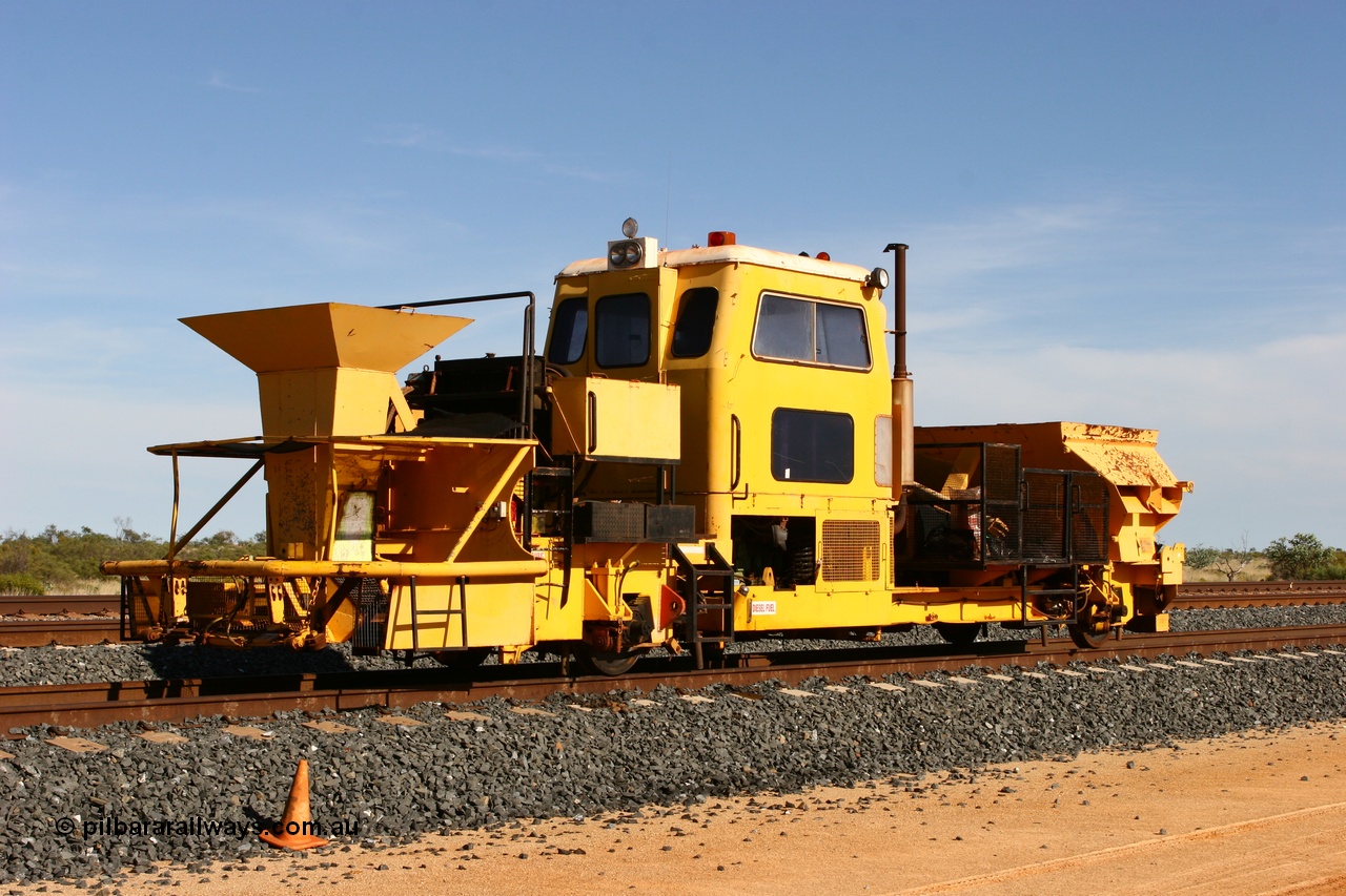 060403 3267
Tabba North backtrack, BHP clip driving machine, modified from a former Plasser Australia USP 3000 ballast regulator. 3rd April 2006.
Keywords: track-machine;Plasser-Australia;USP3000;