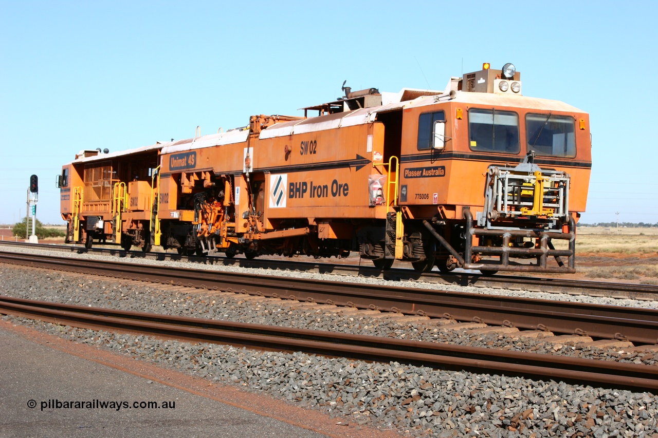 060710 6227
At the Broome Rd grade crossing Port Hedland, Switch Tamper SW 02 a Plasser Australia model Unimat S4 switch tamper. 10th July 2006.
Keywords: SW02;Plasser-Australia;Unimat-4S;track-machine;