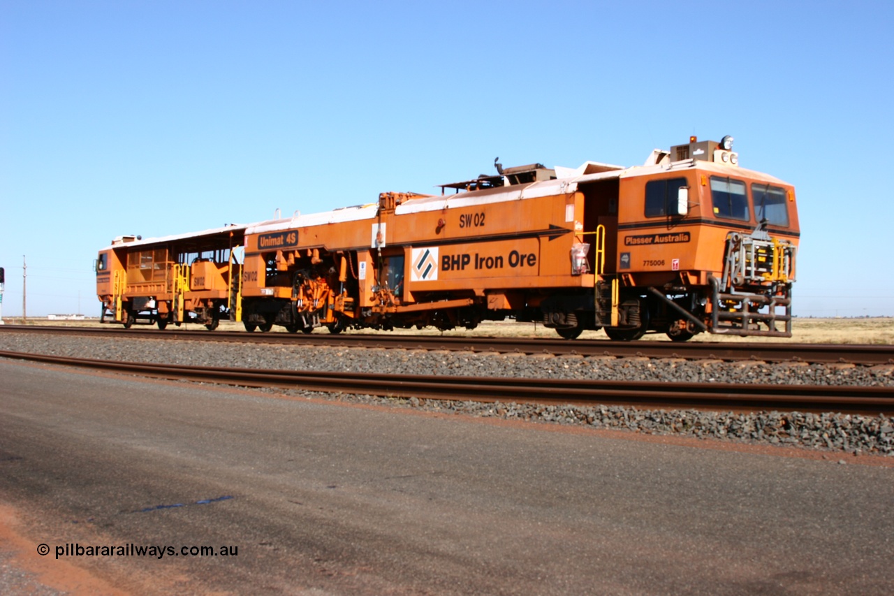 060710 6228
At the Broome Rd grade crossing Port Hedland, Switch Tamper SW 02 a Plasser Australia model Unimat S4 switch tamper. 10th July 2006.
Keywords: SW02;Plasser-Australia;Unimat-4S;track-machine;