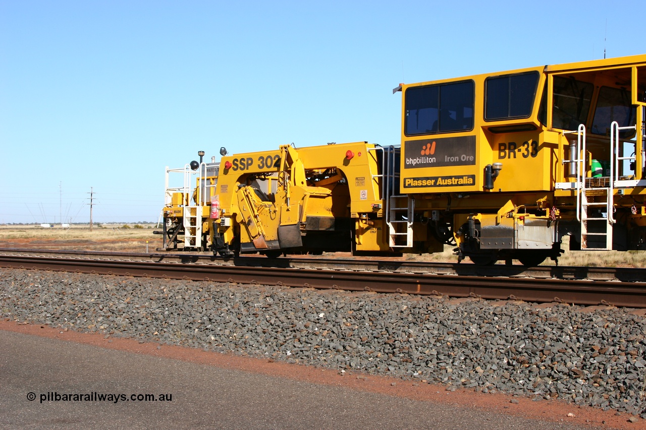 060710 6231
At the Broome Rd grade crossing Port Hedland, track machine BR 33 a Plasser Australia ballast regulator model SSP 302 serial M486. 10th July 2006.
Keywords: BR33;Plasser-Australia;SSP-302;M486;track-machine;