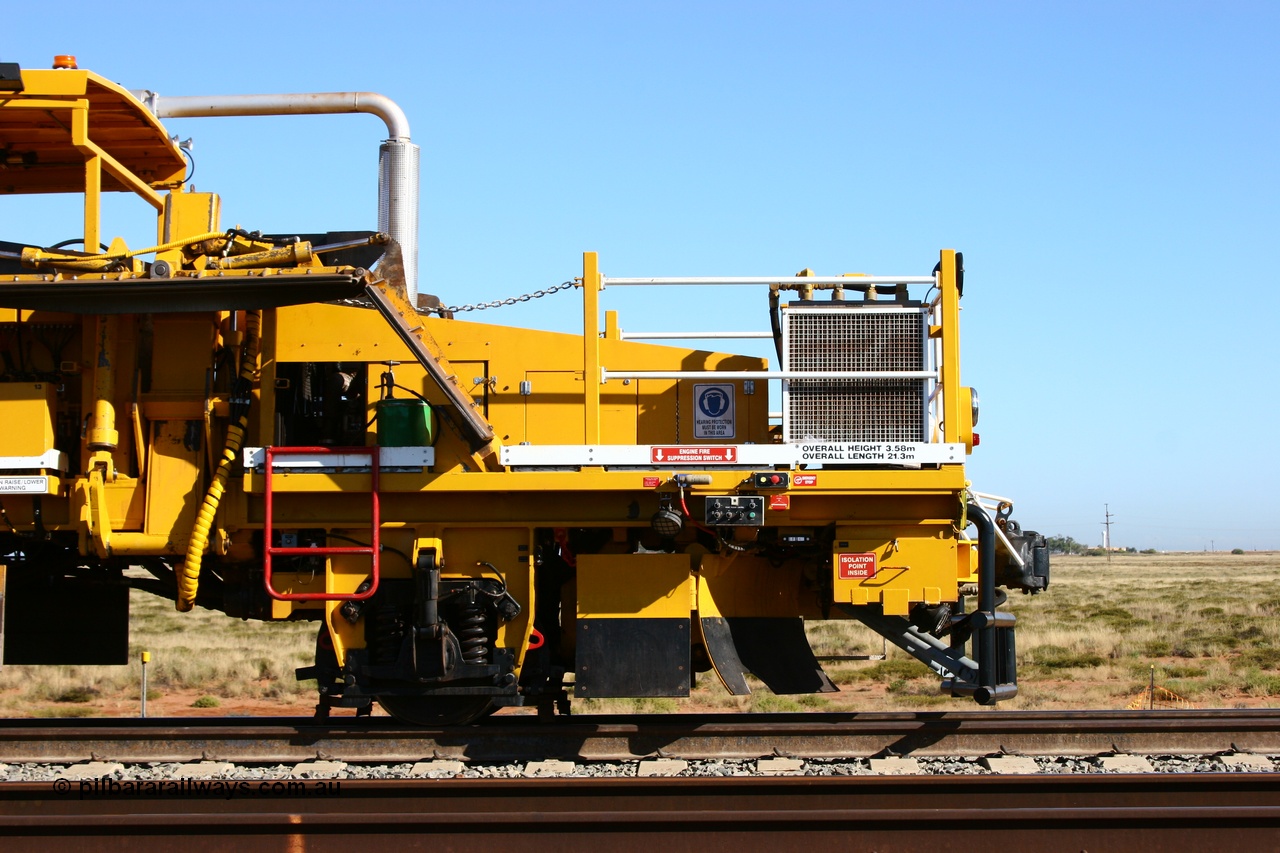 060710 6238
At the Broome Rd grade crossing Port Hedland, track machine BR 33 a Plasser Australia ballast regulator model SSP 302 serial M486. 10th July 2006.
Keywords: BR33;Plasser-Australia;SSP-302;M486;track-machine;