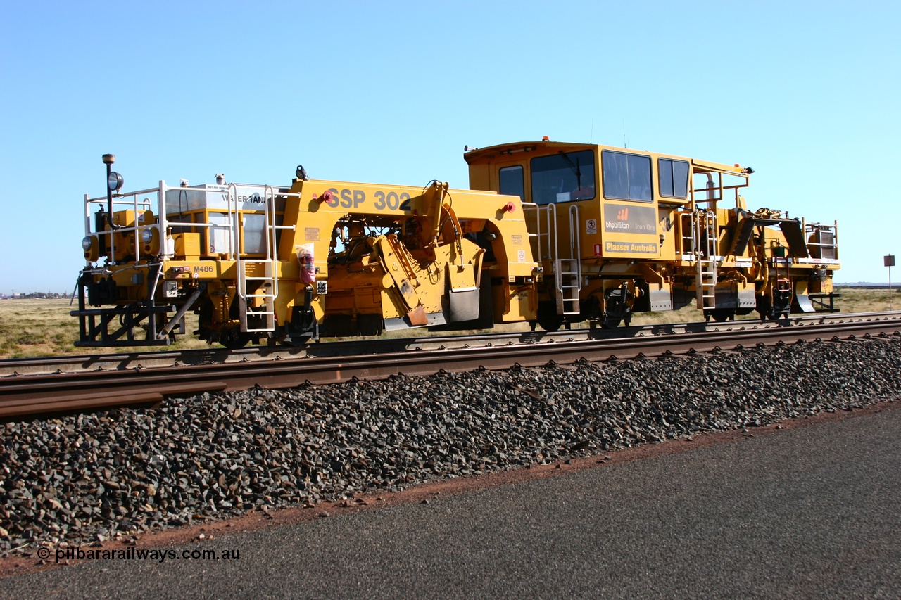 060710 6240
At the Broome Rd grade crossing Port Hedland, track machine BR 33 a Plasser Australia ballast regulator model SSP 302 serial M486. 10th July 2006.
Keywords: BR33;Plasser-Australia;SSP-302;M486;track-machine;