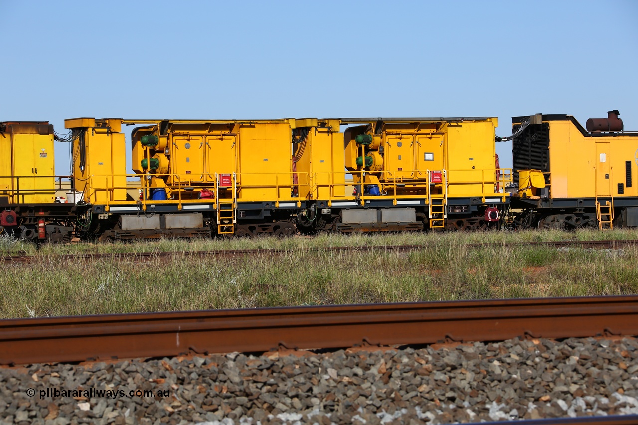 150619 9089
Flash Butt yard, Speno owned and operated rail grinder RG2 for BHP, rail grinding module, from the left, water tank, electrical cabinet, blower fans and filter housing, water tank, water tank, electrical cabinet, blower fans and filter housing, fuel tank.
Keywords: RG2;Speno;track-machine;