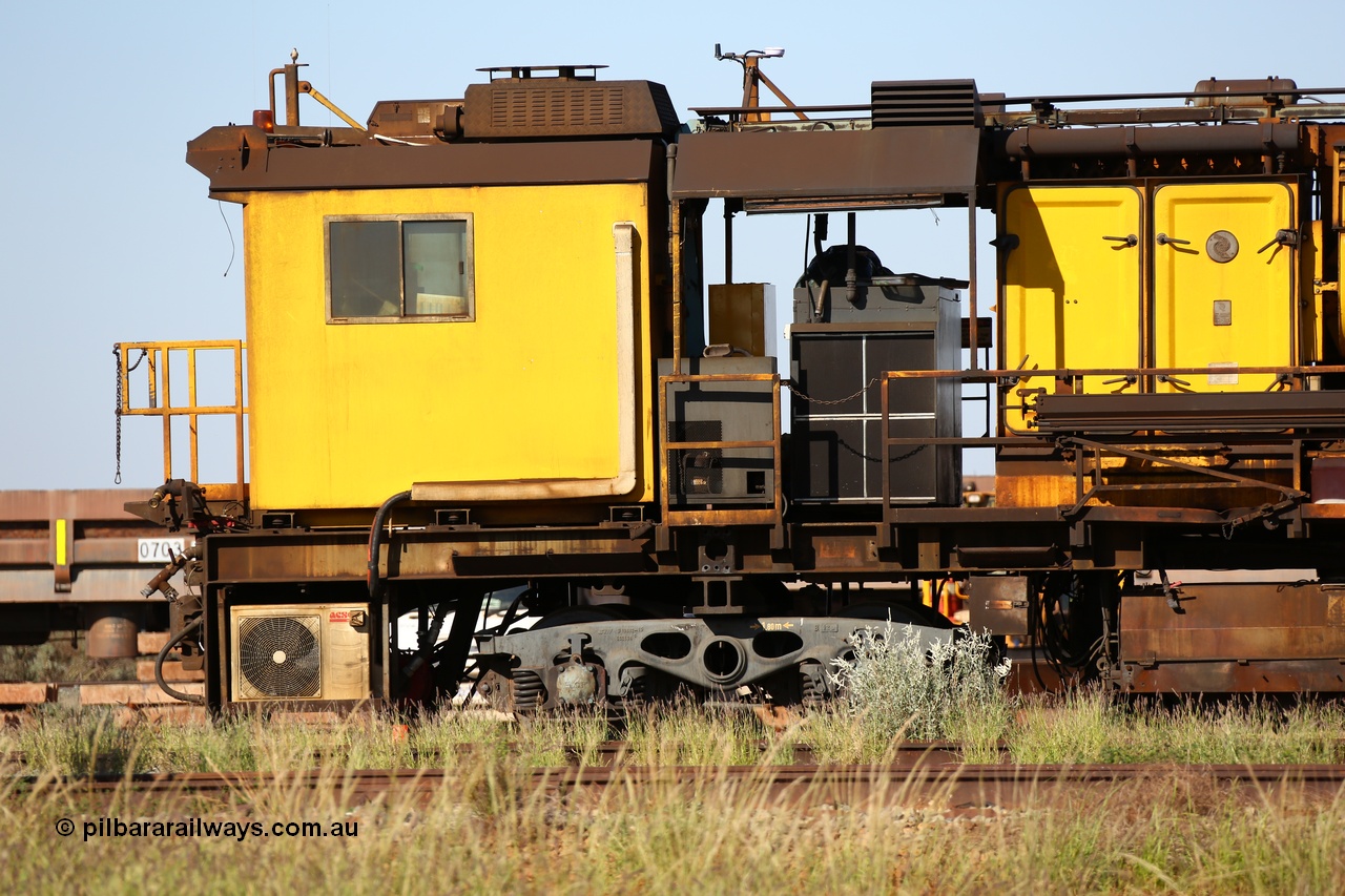 150619 9092
Flash Butt yard, Speno owned and operated rail grinder RG2 for BHP, grinding and driving cab unit. Driving cab, filter and blower housings, shows domestic type split air conditioner for cab cooling.
Keywords: RG2;Speno;track-machine;