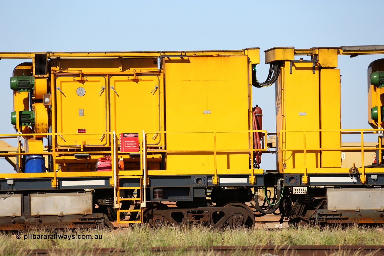 150619 9096
Flash Butt yard, Speno owned and operated rail grinder RG2 for BHP, rail grinding module, from the left blower fans and filter housing, 5000 litre water tank, 2500 litre water tank, electrical cabinet, grinding hoods each side of bogie.
Keywords: RG2;Speno;track-machine;