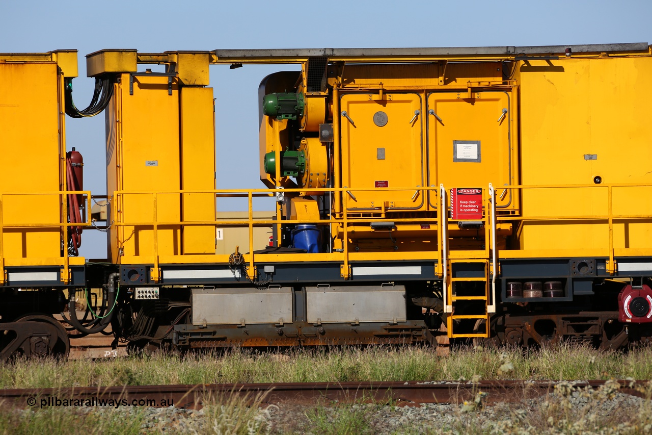 150619 9098
Flash Butt yard, Speno owned and operated rail grinder RG2 for BHP, rail grinding module, from the left end of 5000 litre water tank, 2500 litre water tank, electrical cabinet, blower fans and filter housing, 5000 litre fuel tank, grinding hood between bogies with spare grinding stones or wheels above bogie.
Keywords: RG2;Speno;track-machine;