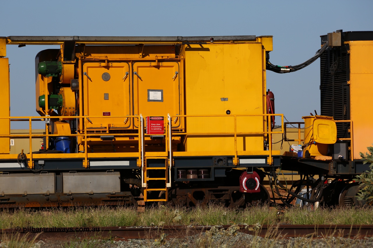 150619 9099
Flash Butt yard, Speno owned and operated rail grinder RG2 for BHP, rail grinding module, from the left blower fans and filter housing, 5000 litre fuel tank, rear of power and driving unit, grinding hood beside bogie with spare grinding stones or wheels above bogie.
Keywords: RG2;Speno;track-machine;