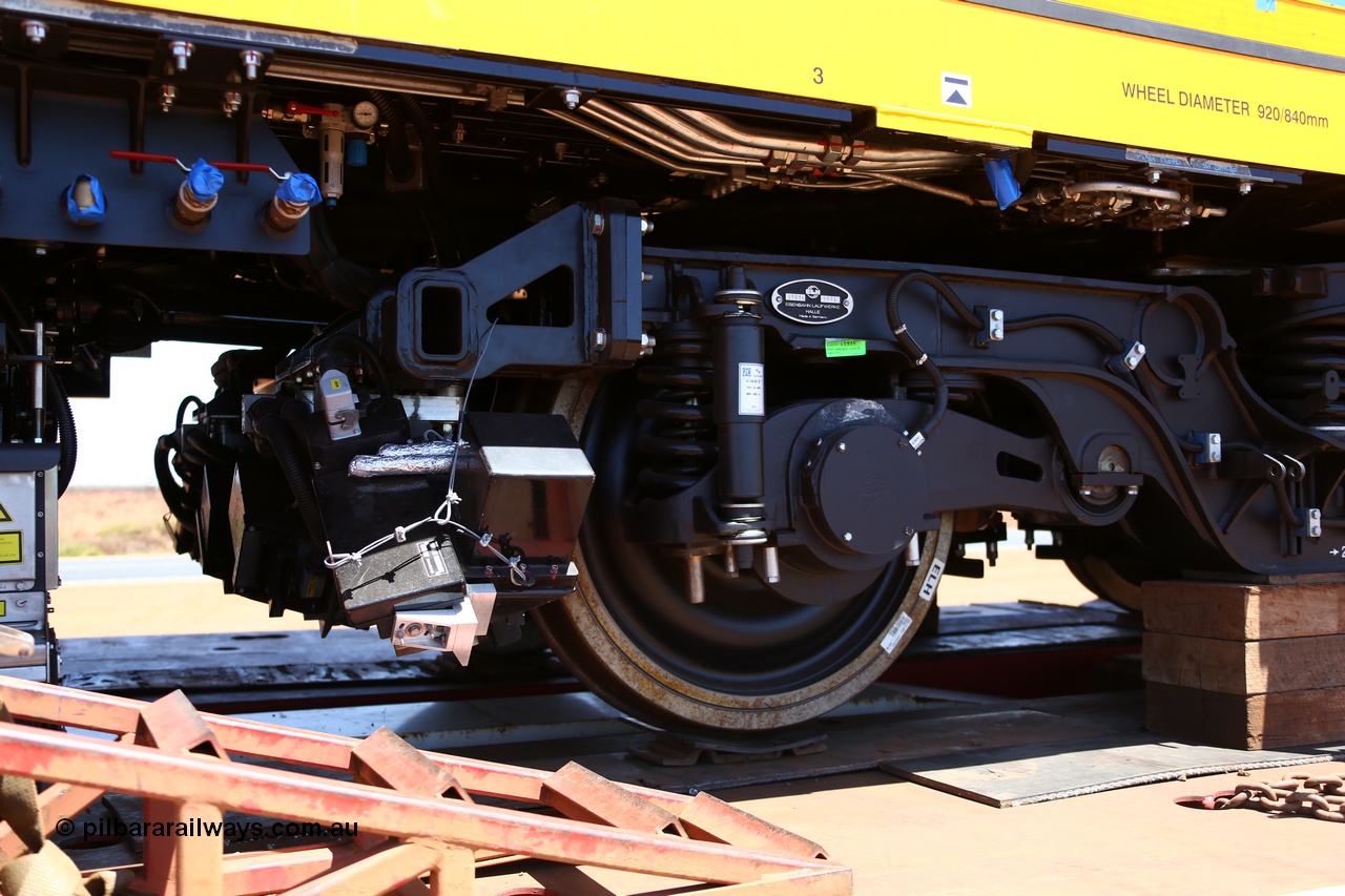 151206 9660
Boodarie, on a Gavin Transport Drake float, BHP's new track recording vehicle which is a Mermec ROGER 800 imported from Italy. Underbody detail of the testing units.
Keywords: MM800;Mermec-Italy;ROGER-800;track-machine;