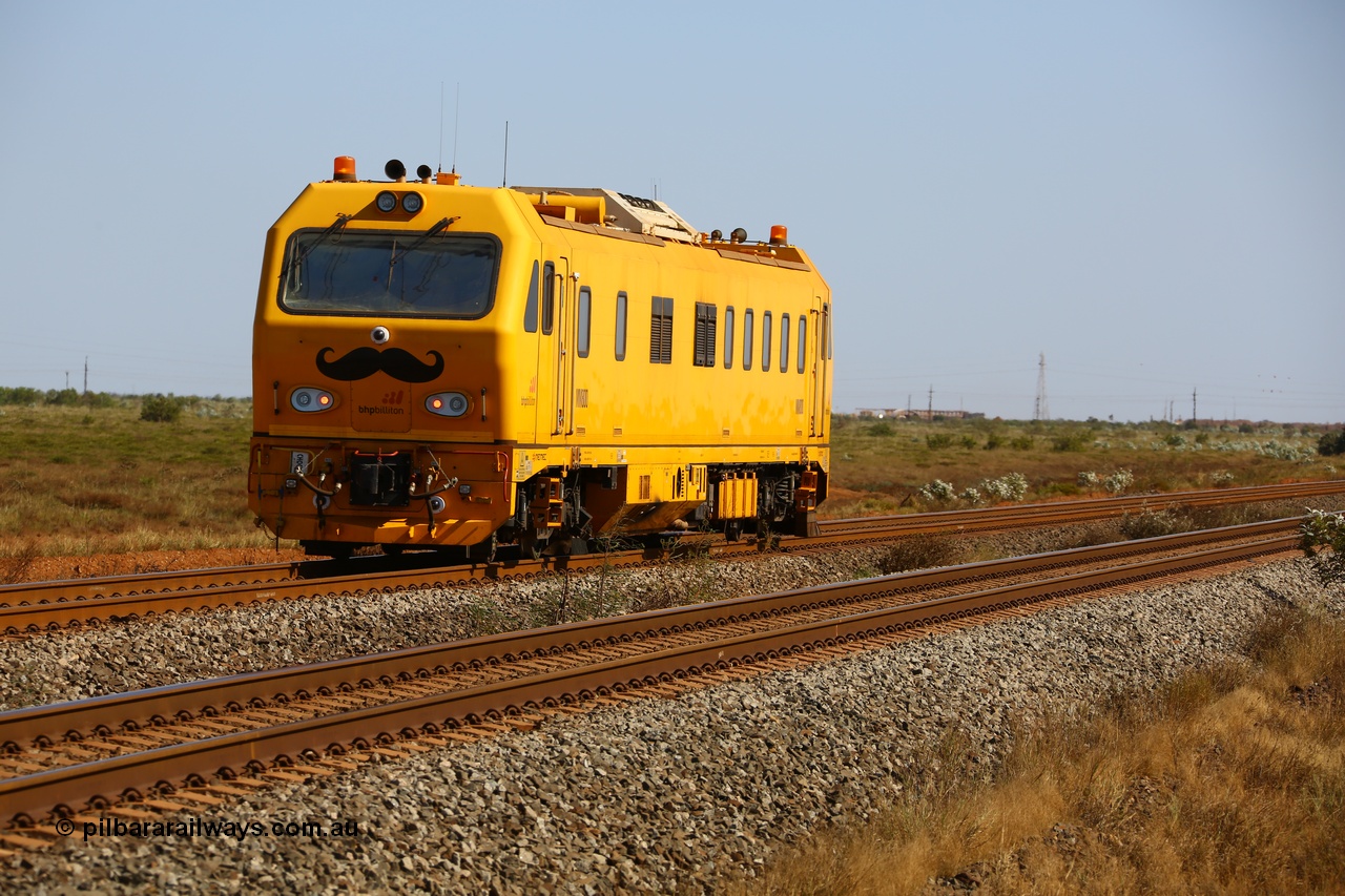 190911 4757
Port Hedland, Broome Rd crossing, BHP's MM 800 track recording vehicle powers south on a recording run, still wearing it's Movember 'mo' as part of a men's health campaign, the MM 800 was built by Mermec in Italy and is a ROGER 800 model, ROGER is an acronym for Rilievo Ottico Geometria Rotaia, Italian for optical rail geometry control.
Keywords: MM800;Mermec-Italy;ROGER-800;track-machine;