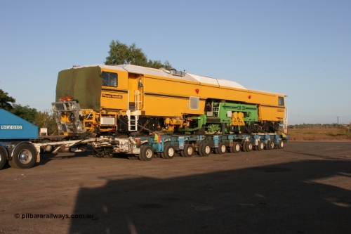 050409 0393
Shell Swagman Roadhouse, Lampson eighty wheel float ready to deliver BHP's new mainline tamper a Plasser Australia 09-3X model with serial M480. 9th April 2005.
Keywords: Tamper3;Plasser-Australia;09-3X;M480;track-machine;