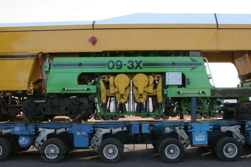 050409 0412
Shell Swagman Roadhouse, Lampson eighty wheel float ready to deliver BHP's new mainline tamper a Plasser Australia 09-3X model with serial M480 view of tamper frame and mechanism. 9th April 2005.
Keywords: Tamper3;Plasser-Australia;09-3X;M480;track-machine;
