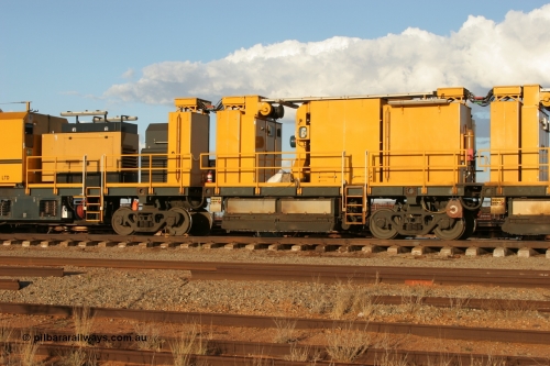 050414 0952
Flash Butt yard, Speno Australia's RR24 model 24 stone rail grinder serial M20 before it had id stickers fitted, this unit was later stickered as RG 1, rear view of the air compressor and driving module coupled to the third grinding module. 14th April 2005.
Keywords: Speno;RR24;M20;track-machine;