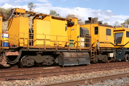 050421 1613
Hesta Siding backtrack, Speno Australia's 24 stone rail grinder before they had id stickers fitted, this front unit was later stickered as RG 2, rear view of the driving cab on the third grinding module. 21st April 2005.
Keywords: Speno;RR24;track-machine;