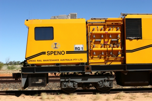 060501 3925
Abydos Siding backtrack, Speno rail grinder RG 1, a RR24 model grinder with 24 grinding wheels, serial M20, generating set and second driving cab module, cab side view. May 1, 2006.
Keywords: RG1;Speno;RR24;M20;track-machine;