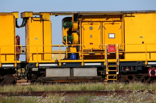 150619 9098
Flash Butt yard, Speno owned and operated rail grinder RG2 for BHP, rail grinding module, from the left end of 5000 litre water tank, 2500 litre water tank, electrical cabinet, blower fans and filter housing, 5000 litre fuel tank, grinding hood between bogies with spare grinding stones or wheels above bogie.
Keywords: RG2;Speno;track-machine;