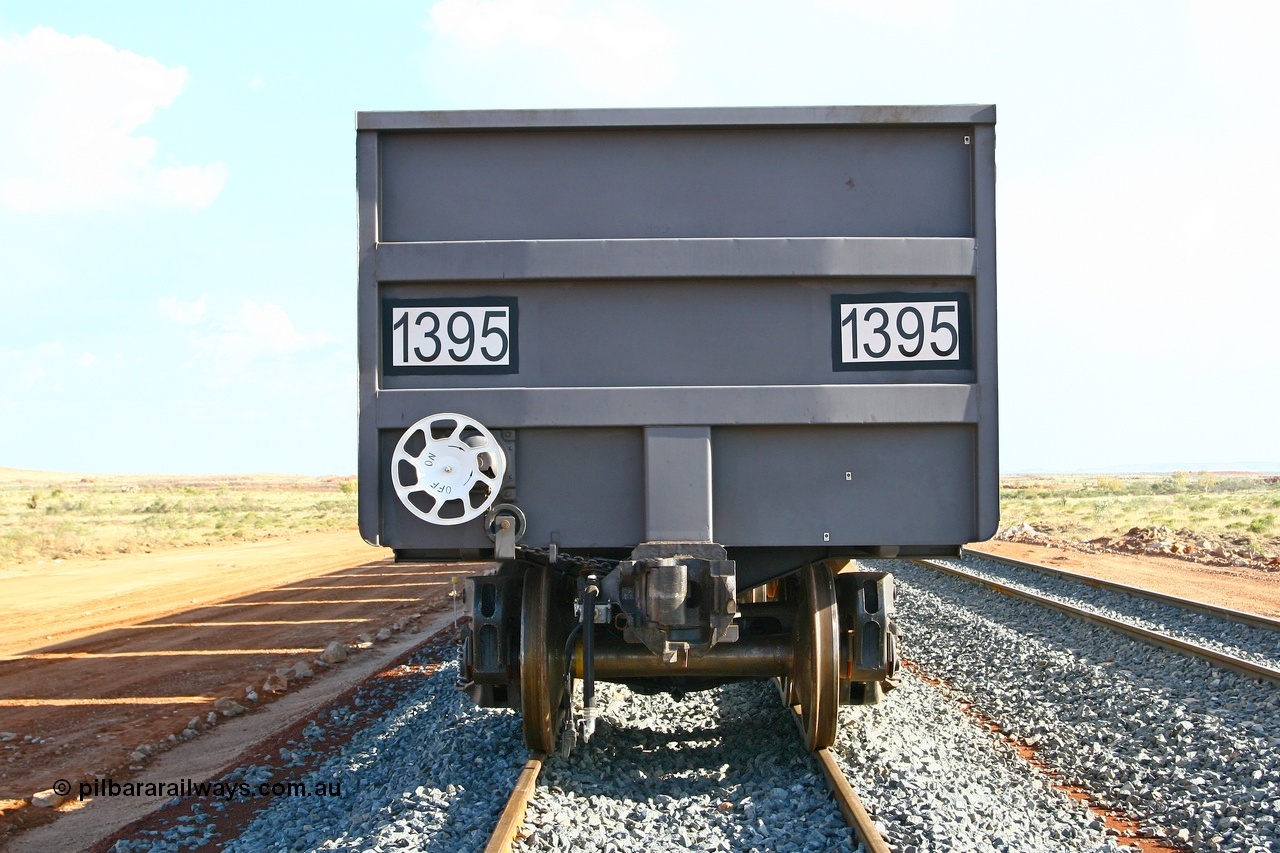 080116 1368
Chapman Siding, view of the hand brake end with F type Interlock coupling and hand brake wheel arrangement, built by China Southern or CSR at their Zhuzhou Rolling Stock Works in China in 2007. 16th January 2008.
Keywords: 1395;CSR-Zhuzhou-Rolling-Stock-Works-China;FMG-ore-waggon;