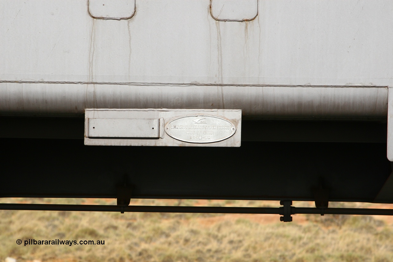 080116 1377
Chapman Siding, FMG slave waggon 1187, built by CSR at their Zhuzhou Rolling Stock Works in China during August 2007, view of the builders plate and bracket for RFID tag. 16th January 2008.
Keywords: 1187;CSR-Zhuzhou-Rolling-Stock-Works-China;FMG-ore-waggon;