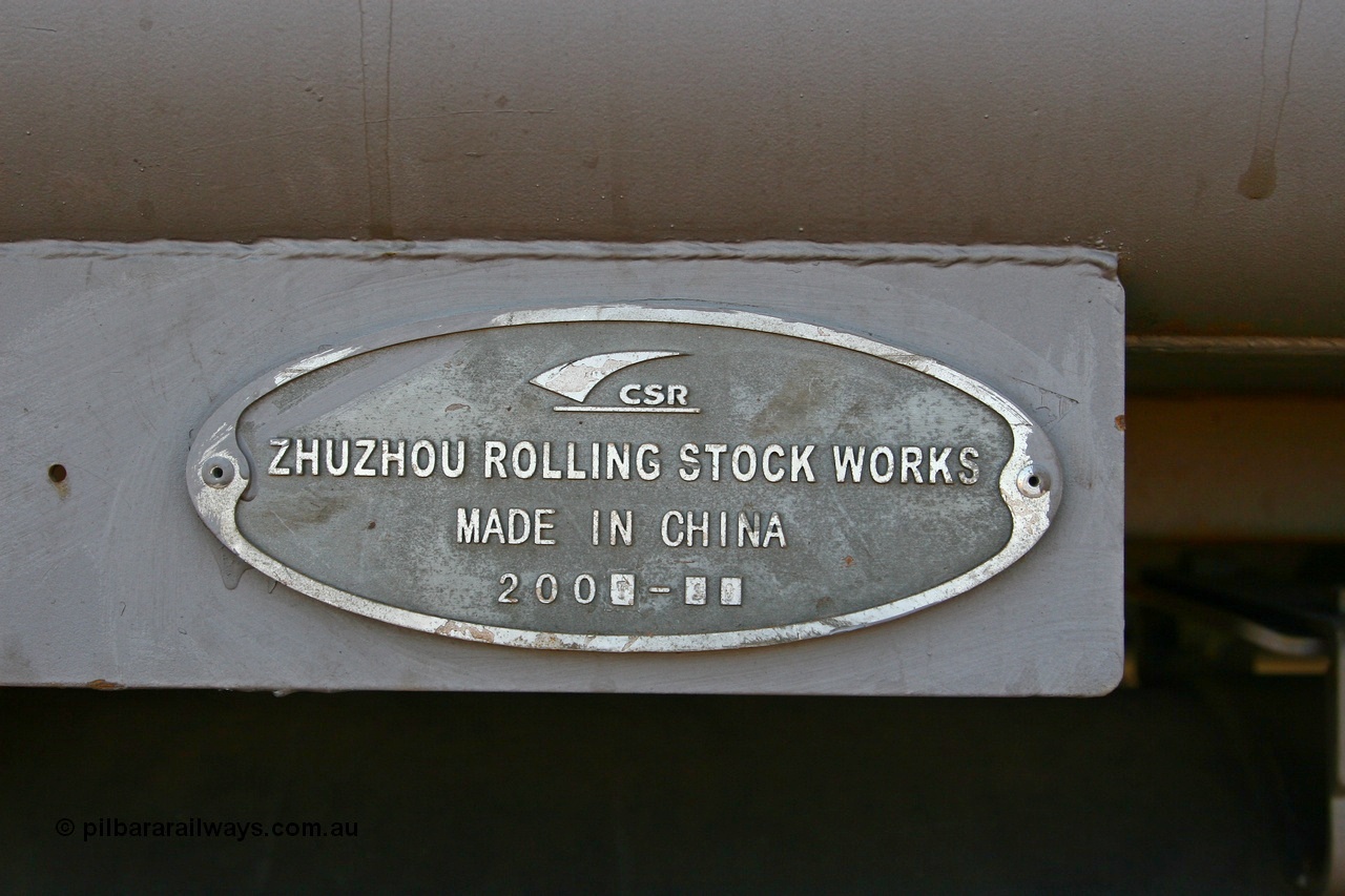 080116 1383
Chapman Siding, builders plate on FMG waggon 2396, CSR Zhuzhou Rolling Stock Works, year of 2007 and month 10 for October.
Keywords: 2396;CSR-Zhuzhou-Rolling-Stock-Works-China;FMG-ore-waggon;