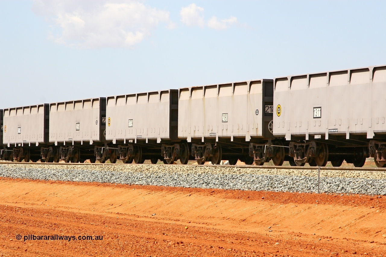 080124 1628
Chapman Siding, new FMG ore waggon pairs 1179 slave and 2180 control and 1259 slave and 2260 control, built by China Southern or CSR at their Zhuzhou Rolling Stock Works in China in 2007. 24th January 2008.
Keywords: 1179-2180;CSR-Zhuzhou-Rolling-Stock-Works-China;FMG-ore-waggon;