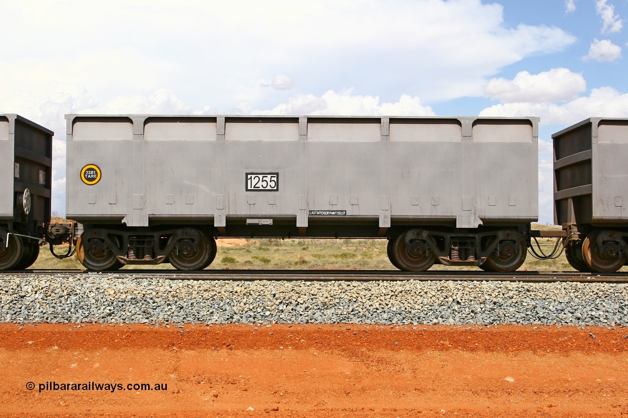 080124 1629
Chapman Siding, side view of slave waggon 1255, the yellow circle around the tare weight 22.6 t indicates the rotary coupler end, built by China Southern or CSR at their Zhuzhou Rolling Stock Works in China in 2007. 24th January 2008.
Keywords: 1256;CSR-Zhuzhou-Rolling-Stock-Works-China;FMG-ore-waggon;