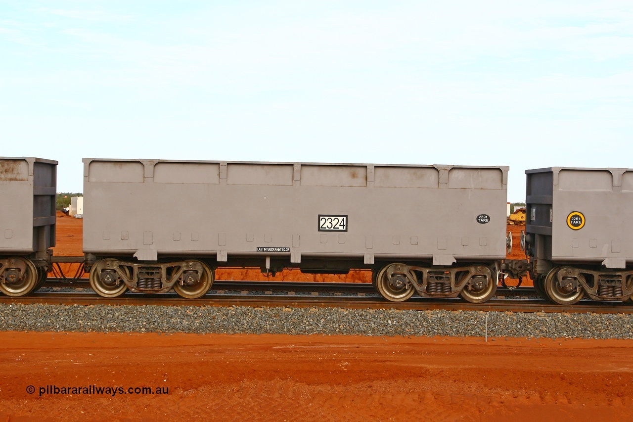 080304 2179
Thomas Yard, down the rail welding end, side view of control waggon 2324, built by China Southern or CSR at their Zhuzhou Rolling Stock Works in China in 2007. 4th March 2008.
Keywords: 2324;CSR-Zhuzhou-Rolling-Stock-Works-China;FMG-ore-waggon;