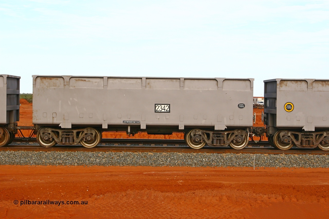 080304 2181
Thomas Yard, down the rail welding end, side view of control waggon 2342, built by China Southern or CSR at their Zhuzhou Rolling Stock Works in China in 2007. 4th March 2008.
Keywords: 2342;CSR-Zhuzhou-Rolling-Stock-Works-China;FMG-ore-waggon;