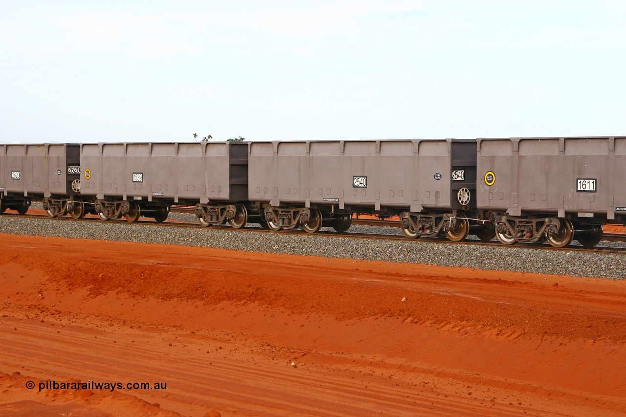 080304 2195
Thomas Yard, down the rail welding end, new FMG ore waggon pair 1539 slave and 2540 control, built by China Southern or CSR at their Zhuzhou Rolling Stock Works in China in 2007. 4th March 2008.
Keywords: 1539-2540;CSR-Zhuzhou-Rolling-Stock-Works-China;FMG-ore-waggon;