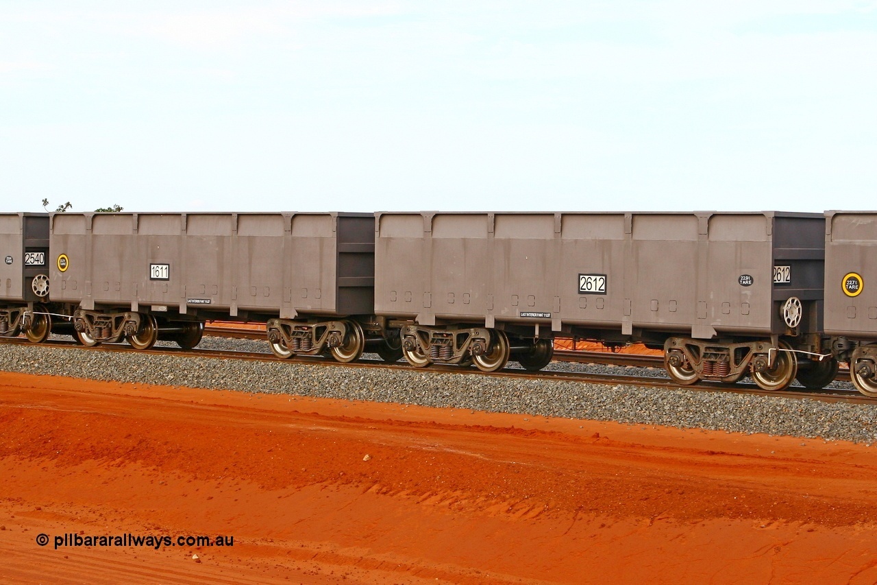 080304 2196r
Thomas Yard, down the rail welding end, new FMG ore waggon pair 1611 slave and 2612 control, built by China Southern or CSR at their Zhuzhou Rolling Stock Works in China in 2007. 4th March 2008.
Keywords: 1611-2612;CSR-Zhuzhou-Rolling-Stock-Works-China;FMG-ore-waggon;