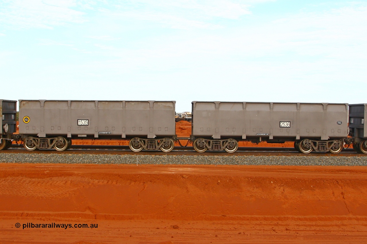 080304 2198
Thomas Yard, down the rail welding end, new FMG ore waggon pair 1535 slave and 2536 control, built by China Southern or CSR at their Zhuzhou Rolling Stock Works in China in 2007. 4th March 2008.
Keywords: 1535-2536;CSR-Zhuzhou-Rolling-Stock-Works-China;FMG-ore-waggon;