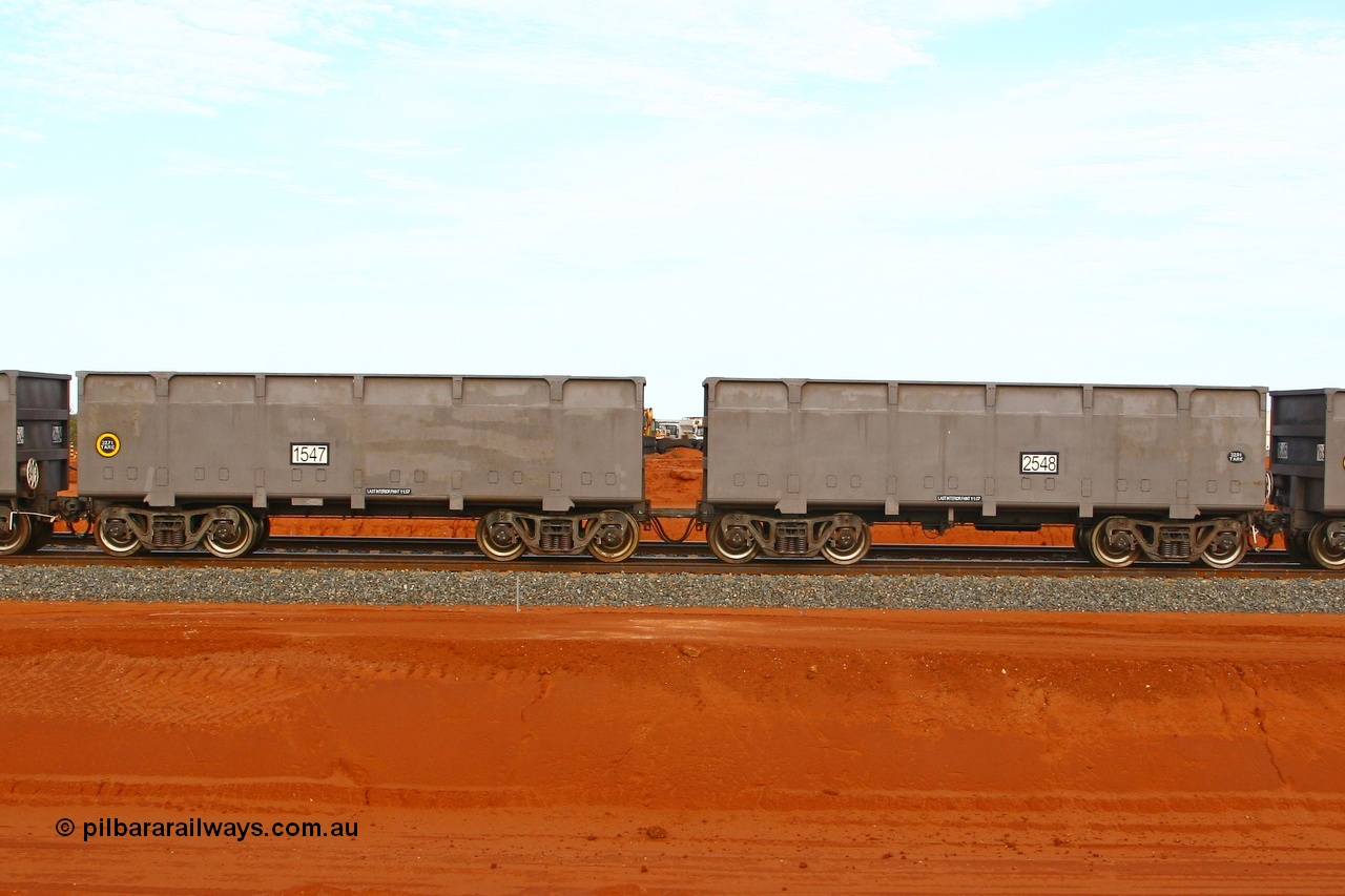 080304 2200
Thomas Yard, down the rail welding end, new FMG ore waggon pair 1547 slave and 2548 control, built by China Southern or CSR at their Zhuzhou Rolling Stock Works in China in 2007. 4th March 2008.
Keywords: 1547-2548;CSR-Zhuzhou-Rolling-Stock-Works-China;FMG-ore-waggon;