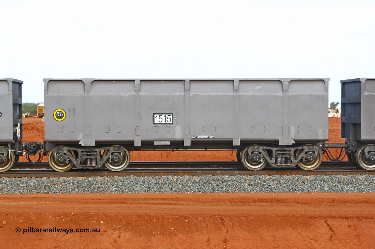 080304 2203
Thomas Yard, down the rail welding end, side view of slave waggon 1515, the yellow circle around the tare weight 22.6 t indicates the rotary coupler end, built by China Southern or CSR at their Zhuzhou Rolling Stock Works in China in 2007. 4th March 2008.
Keywords: 1515;CSR-Zhuzhou-Rolling-Stock-Works-China;FMG-ore-waggon;